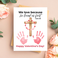 Christian Valentine Cross Handprint Craft | 1 John 4:19 We Love Because He Loved Us First Printable Bible Verse Printable for Kids
