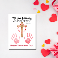 Christian Valentine Cross Handprint Craft | 1 John 4:19 We Love Because He Loved Us First Printable Bible Verse Printable for Kids