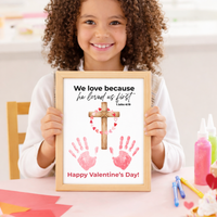 Christian Valentine Cross Handprint Craft | 1 John 4:19 We Love Because He Loved Us First Printable Bible Verse Printable for Kids